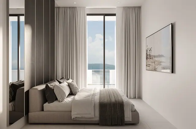 Next Point Condominium — Спальня у панорамного окна с видом на море · 3 спальни, Раваи и Най Харн, Пхукет